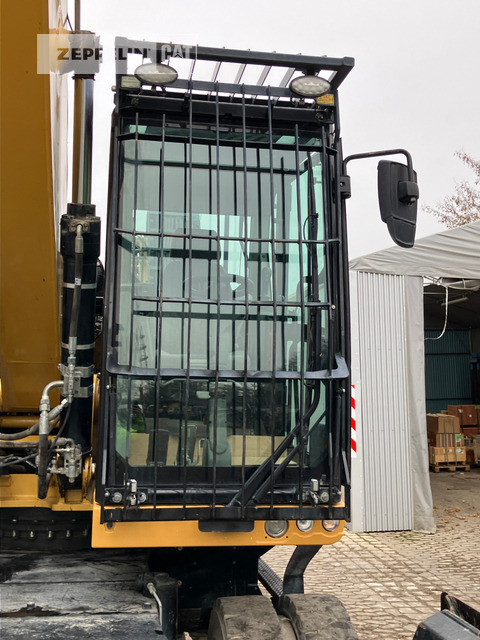 Cat MH3024-06C - Перегружатель: фото 1 Cat MH3024-06C - Перегружатель: фото 1